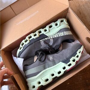 On Running Black and Green Athletic Shoes